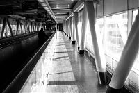 Woman on Moving Walkway Woman on Moving Walkway