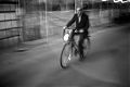 Man Riding Bicycle at Night