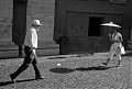Man and Woman With Umbrella Man and Woman With Umbrella