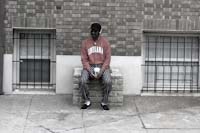 Man Outside Apartment Block