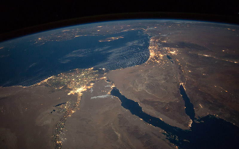 Nighttime view of northern Egypt and the Sinai Peninsula --- ISS049e004516 (09/16/2016) --- This nighttime view of northern Egypt and the Sinai Peninsula was captured by the Expedition 49 crew aboard the International Space Station. The city of Cairo can be seen to the left at the top of the Nile river. Atop the sparsely lit Sinai Peninsula can be seen cities in Israel, including the brightly lit city of Tel Aviv on the Israeli coast along the Mediterranean sea. https://www.flickr.com/photos/nasa2explore/29185511983/
.